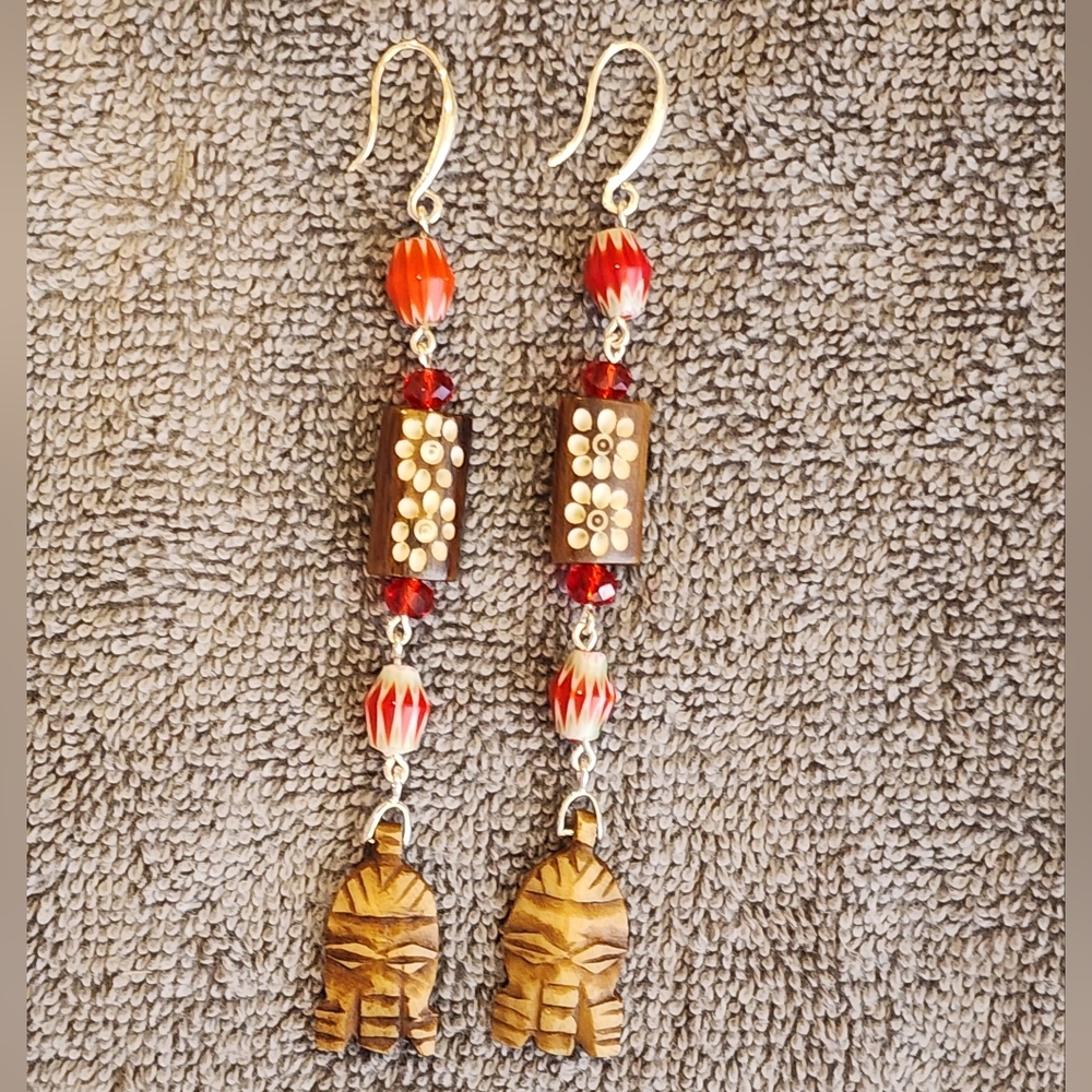 Red and white long diva length tribal mask earrings
